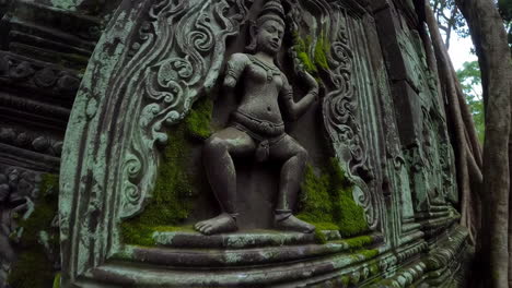ancient khmer temple carvings in angkor wat, cambodia