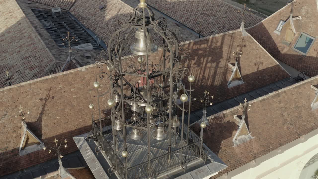 Bell tower atop famous Château Angelus winery, Saint-Émilion wine region in Bordeaux, France. Aerial orbiting