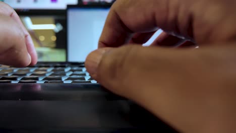 first-person view of hands and fingers typing on a keyboard, illustrating the concept of productivity and digital interaction