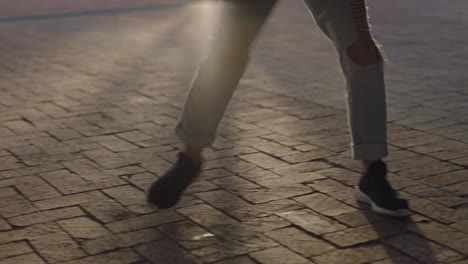 dancing woman young hip hop dancer in city enjoying fresh urban freestyle dance moves practicing expression at sunset close up