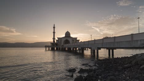 timelapse floating mosque during sunset hour