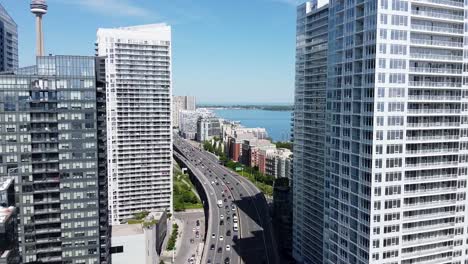 Drone-flying-over-Gardiner-Expressway-in-downtown-Toronto-on-a-summer-day