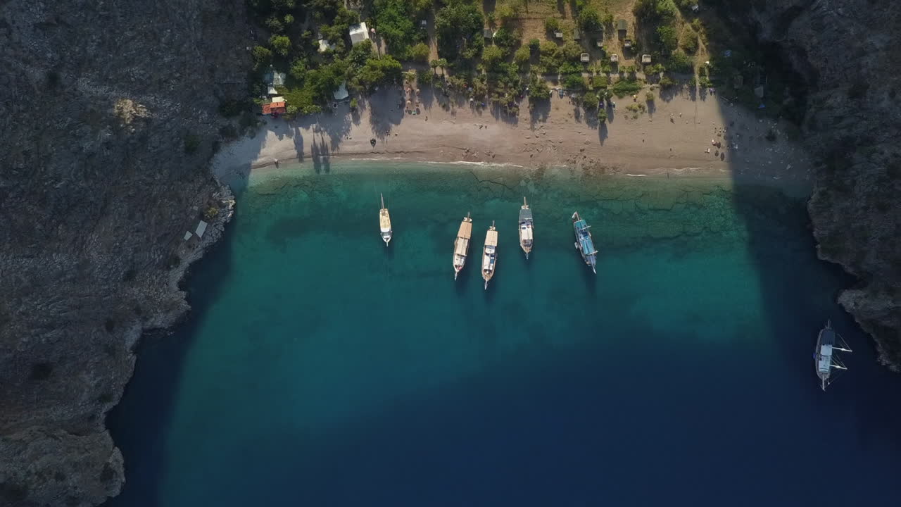 Aerial view: Secluded Butterfly Valley beach on mountain Turkey coast
