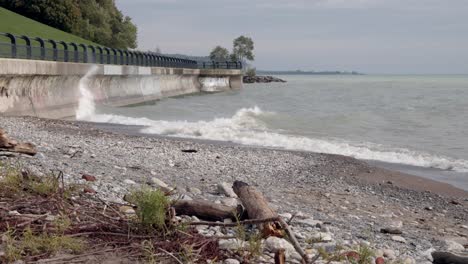 Beach,-Water-front,-With-waves-breaking-on-wall,-Fall