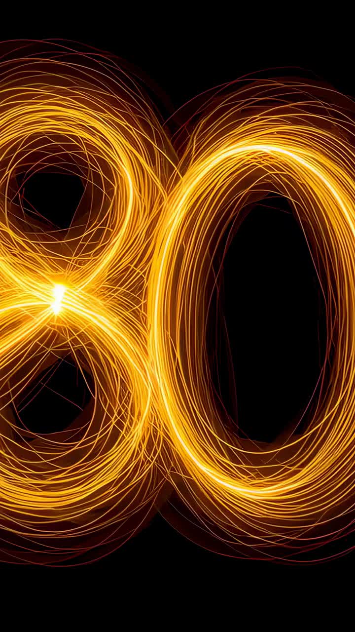 Vertical video: Sparking golden tracer tracing looping 8 on black, building 8-shape, flares