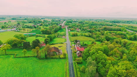 Aerial-drone-shot-of-an-herd-of-sheep-in-a-farm