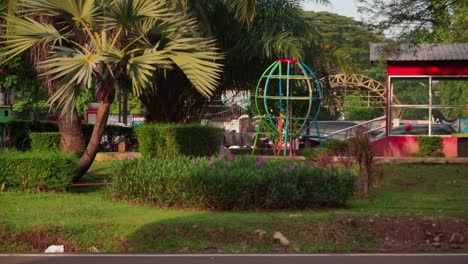 city   park between road, semarang, central java, indonesia on june 10, 2022