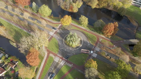 high angle view of a busy roundabout in the netherlands - drone slowly setting down