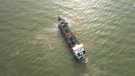 Aerial-view-of-a-large-container-ship-in-brazilian-ocean,-Itajai,-Santa-Catarina,-Brazil