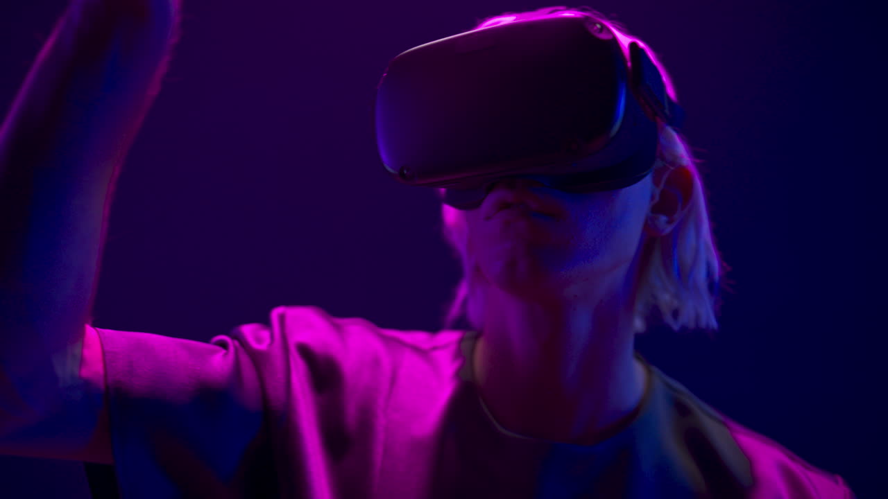 Young man touching playing virtual game closeup. Metaverse technology concept