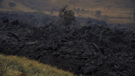 Serene-footage-of-lava-rivers-flowing-at-dusk-over-farms-around-Pacaya-Volcano