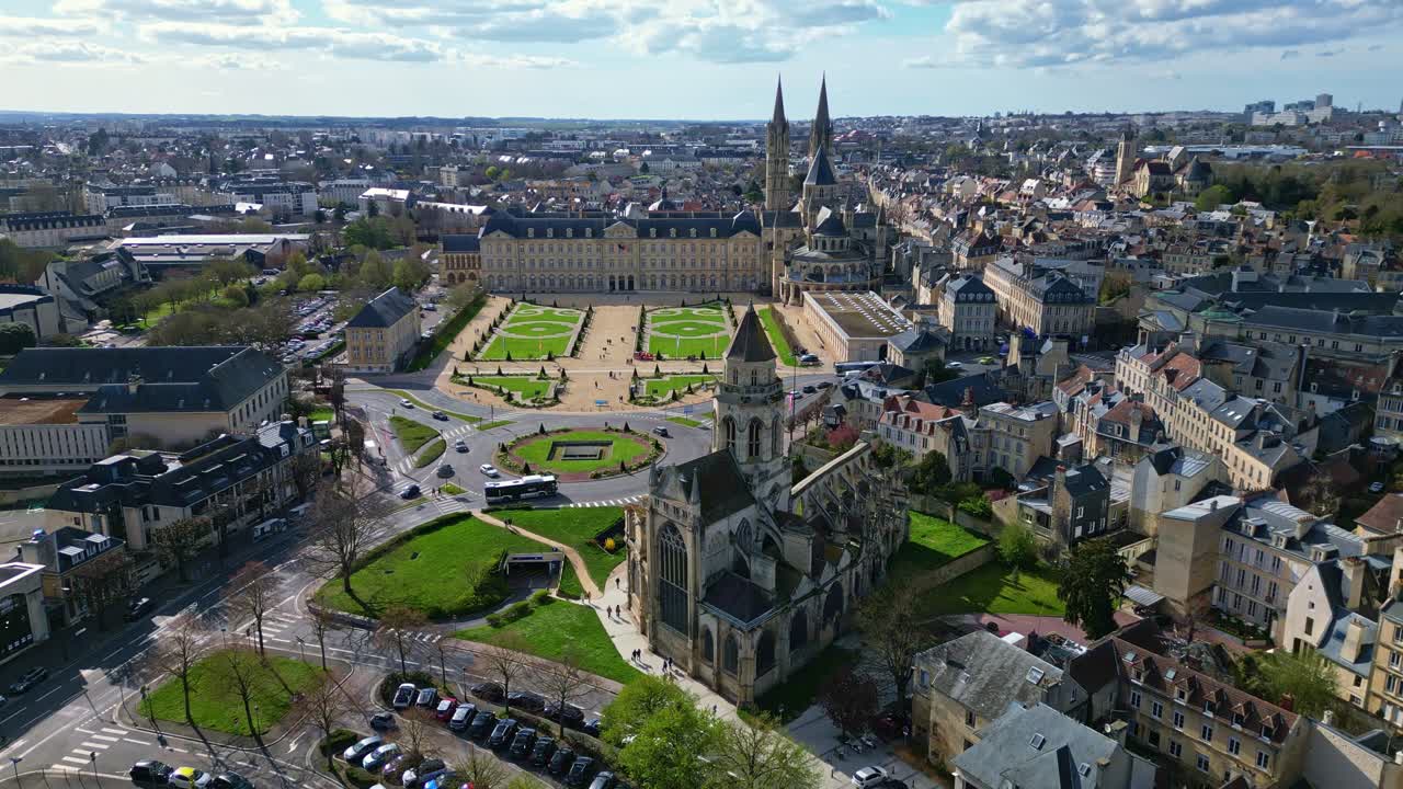 Caen town hall, historic Eglise Saint-Étienne-le-Vieux church ruins, Abbaye aux Hommes or Abbey men, cityscape, France. Aerial forward