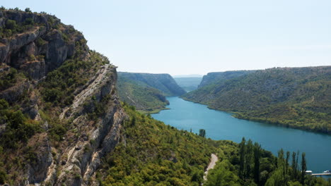 tranquil water of canyon krka river in krka national park, croatia, europe - aerial drone shot