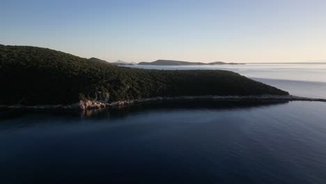 cinematic reveal drone shot at coast greece