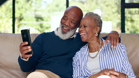 Home,-old-couple-on-a-couch