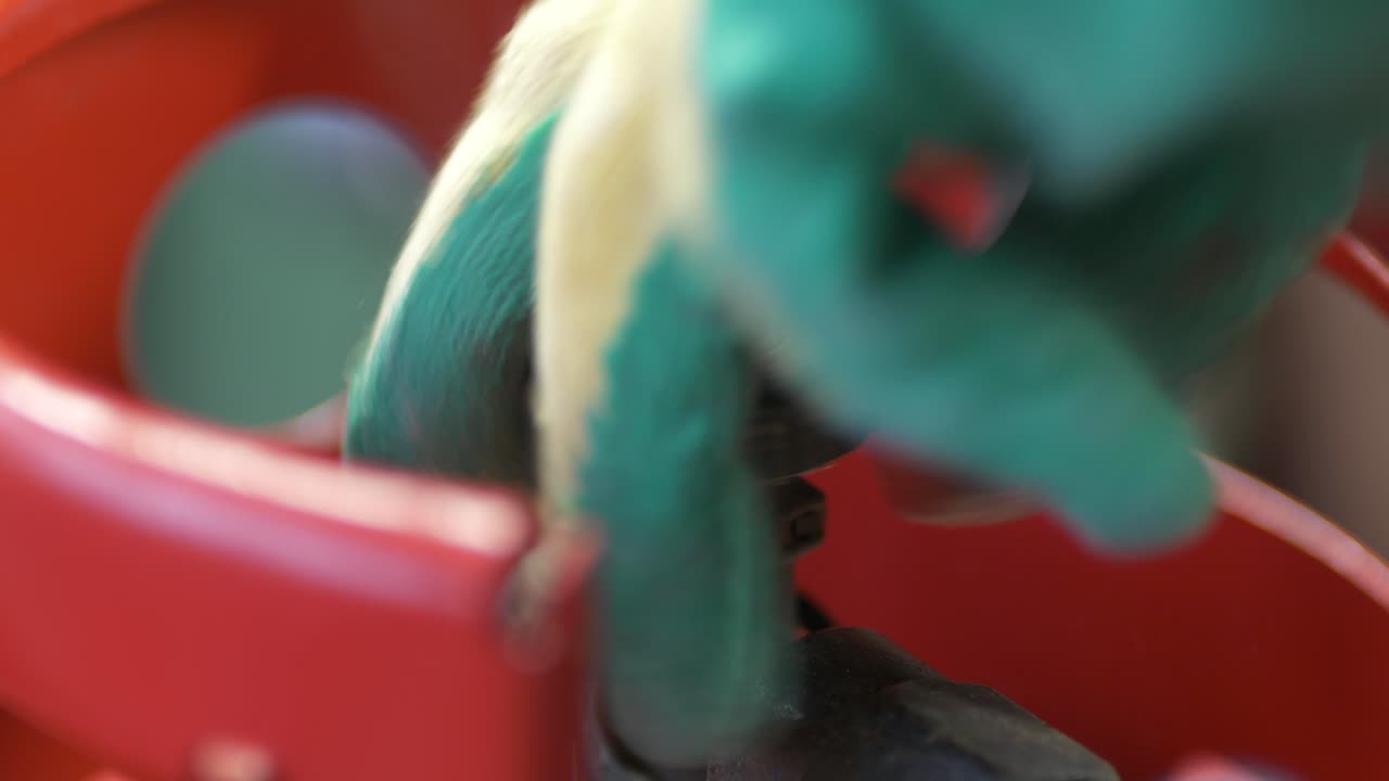 Opening LPG gas bottle valve wearing gloves