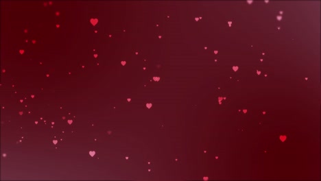 Pink-heart-shapes-falling-on-dark-red-background