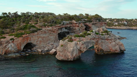 natural stone arch of es pontas in cala llombards, mallorca island, spain