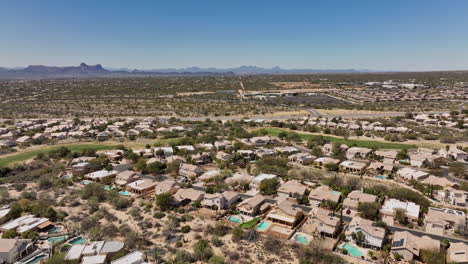 tucson arizona aerial v7 flyover and around oro valley canada hills neighborhoods with golf course, capturing panoramic views of mountainscape and desert views - shot with mavic 3 cine - march 2022