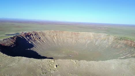 an incredible high angle aerial of meteor crater arizona