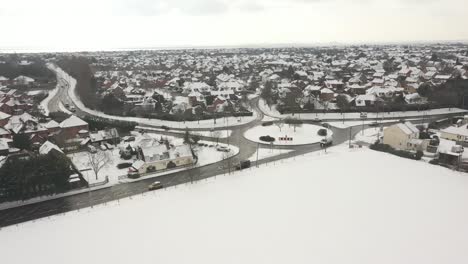 Aerial-shot-roundabout-in-view-as-view-moves-down-to-the-left