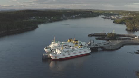 Slow-orbit-of-ferries-and-ferry-terminal