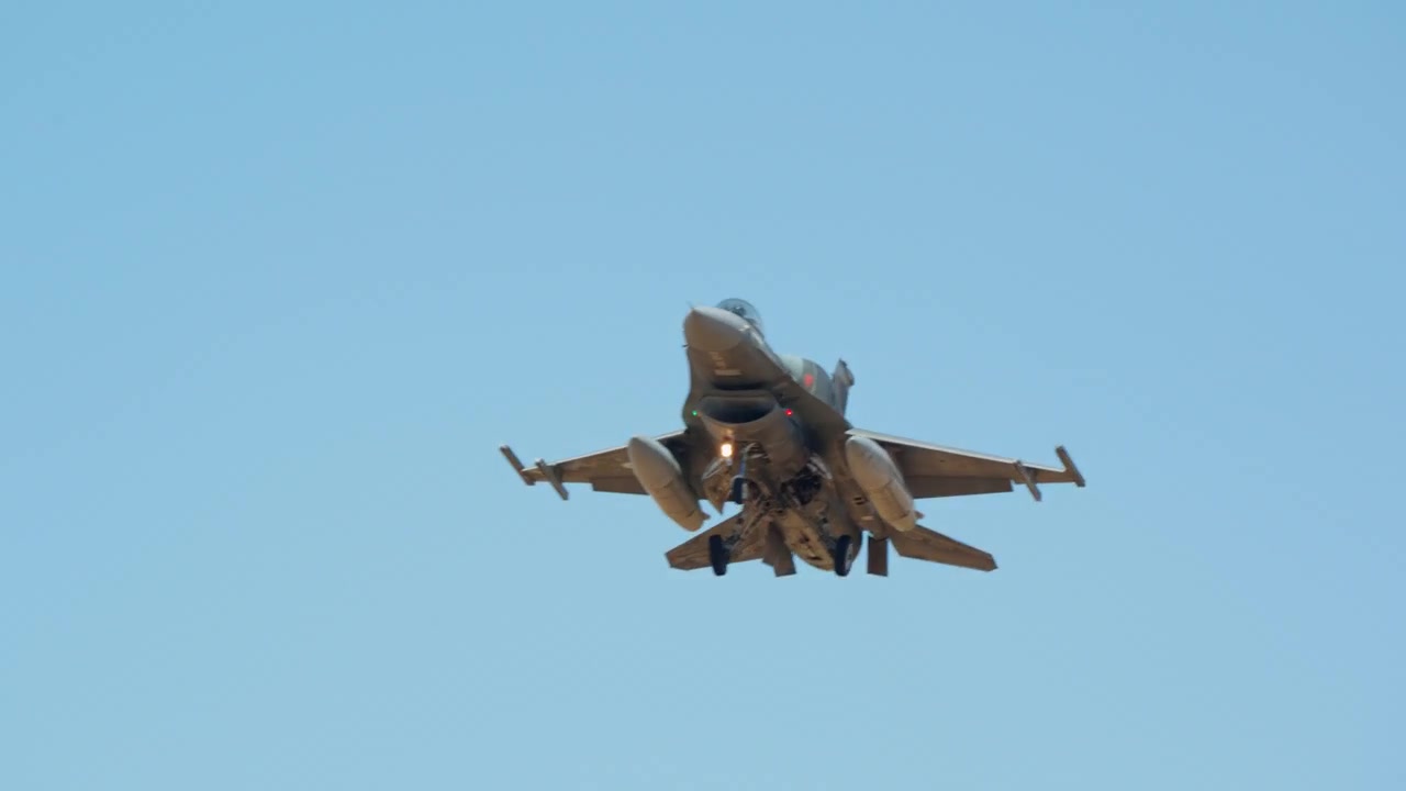 Combat jet close underside view landing gear down