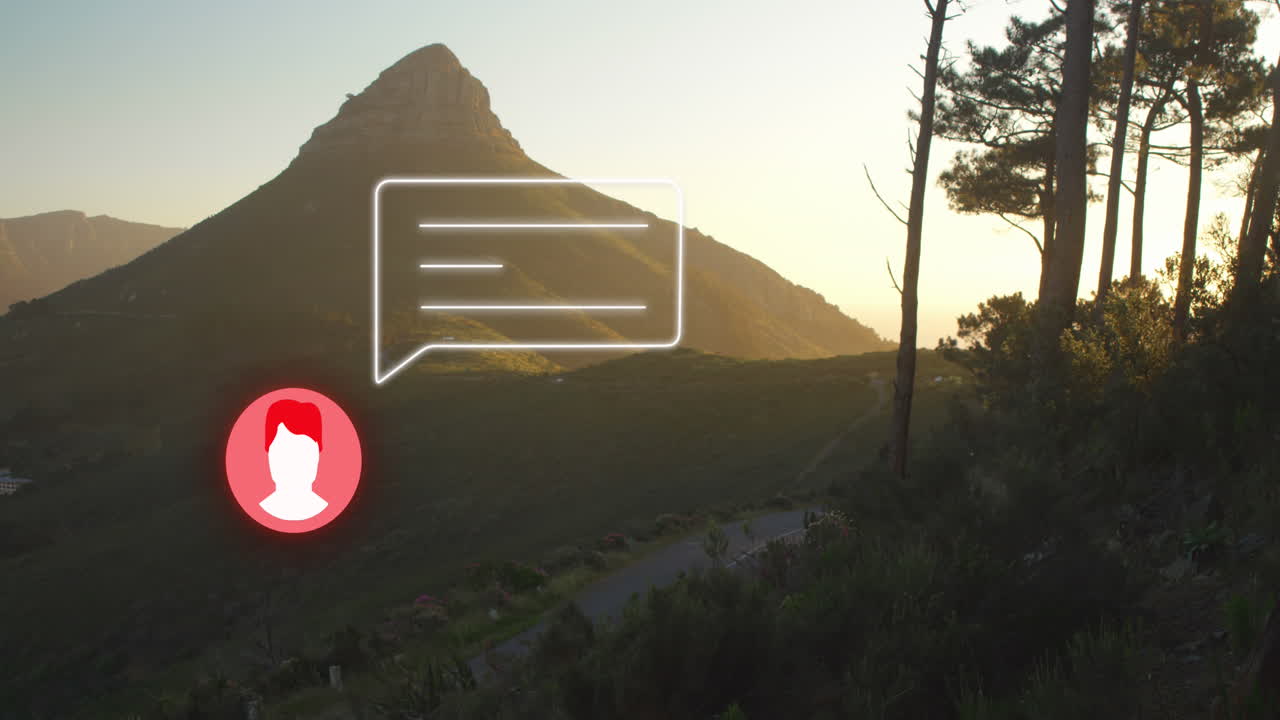 анимация неонового профиля и значка сообщения на фоне пейзажа с горами и лесом.