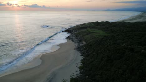 Bacocho-beach-at-sunset-with-sand-dunes-and-ocean-waves-in-Puerto-Escondido-mexico