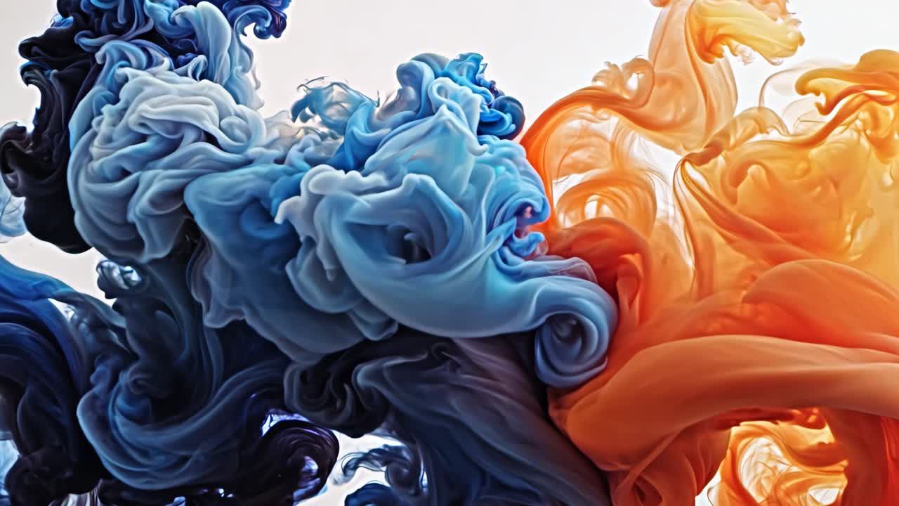 The smoke is blue and orange. It looks like a wave. The colors are bright and vibrant