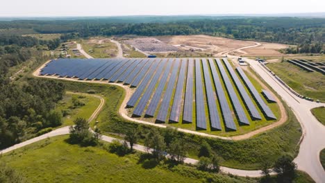 drone backtracking over a solar panel farm in france