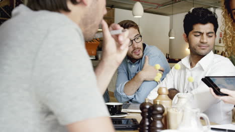 small business team meeting global sharing economy tablet touchscreen cafe