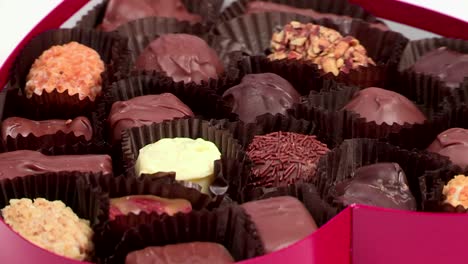 heart shaped box of mixed chocolates rotating