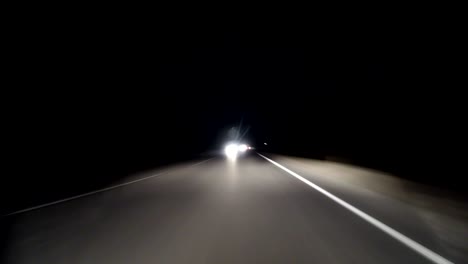 pov timelapse fast car drive old countryroad at night. flow of oncoming trucks. drive pov old road timelapse/hyperlapse night. pov night driving hyperlapse at highway passing a series of tunnels. camera is placed outside vehicle and level is horizontal