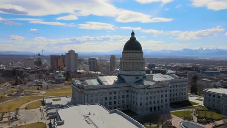 excellent aerial shot of a state capitol building and nearby buildings in an american city