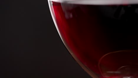 closeup of a glass of red wine dynamic light