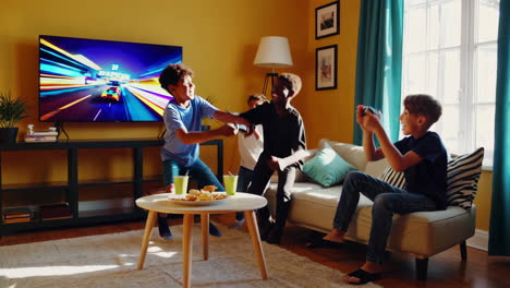 young boys enthusiastically playing video games in a living room