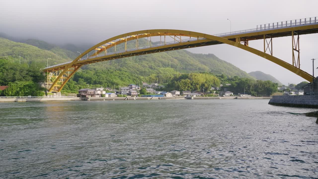 Bridge over Seto Inland sea islands with mountains