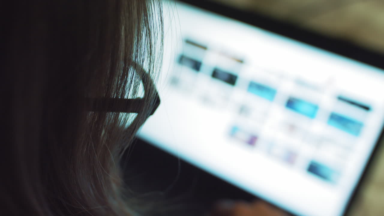 Woman Browsing Laptop