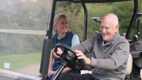 people in a golf cart