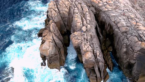 Aerial-drone-shot-of-a-place-known-as-paper-cliffs,-in-the-area-of-Morás,-Xove,-Lugo,-Galicia,-Spain-at-daytime