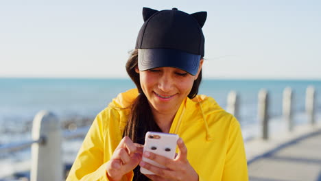 teenager, phone and sea with a girl browsing