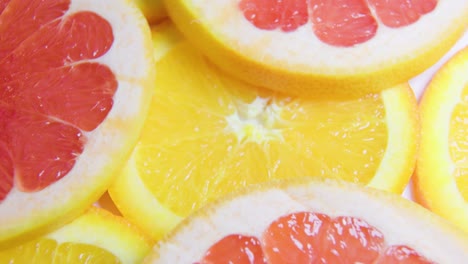 close up many colorful fresh citrus fruit slices orange, grapefruit