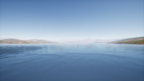 lake in hills on summer day