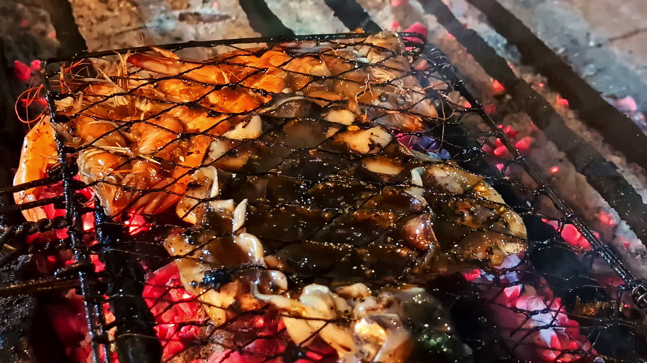 Fresh prawns and fish grilling in basket over hot coals, Lombok, Bali