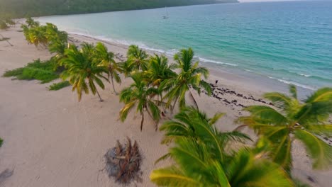 drone flying over secluded tropical beach of playa rincon in samana, dominican republic