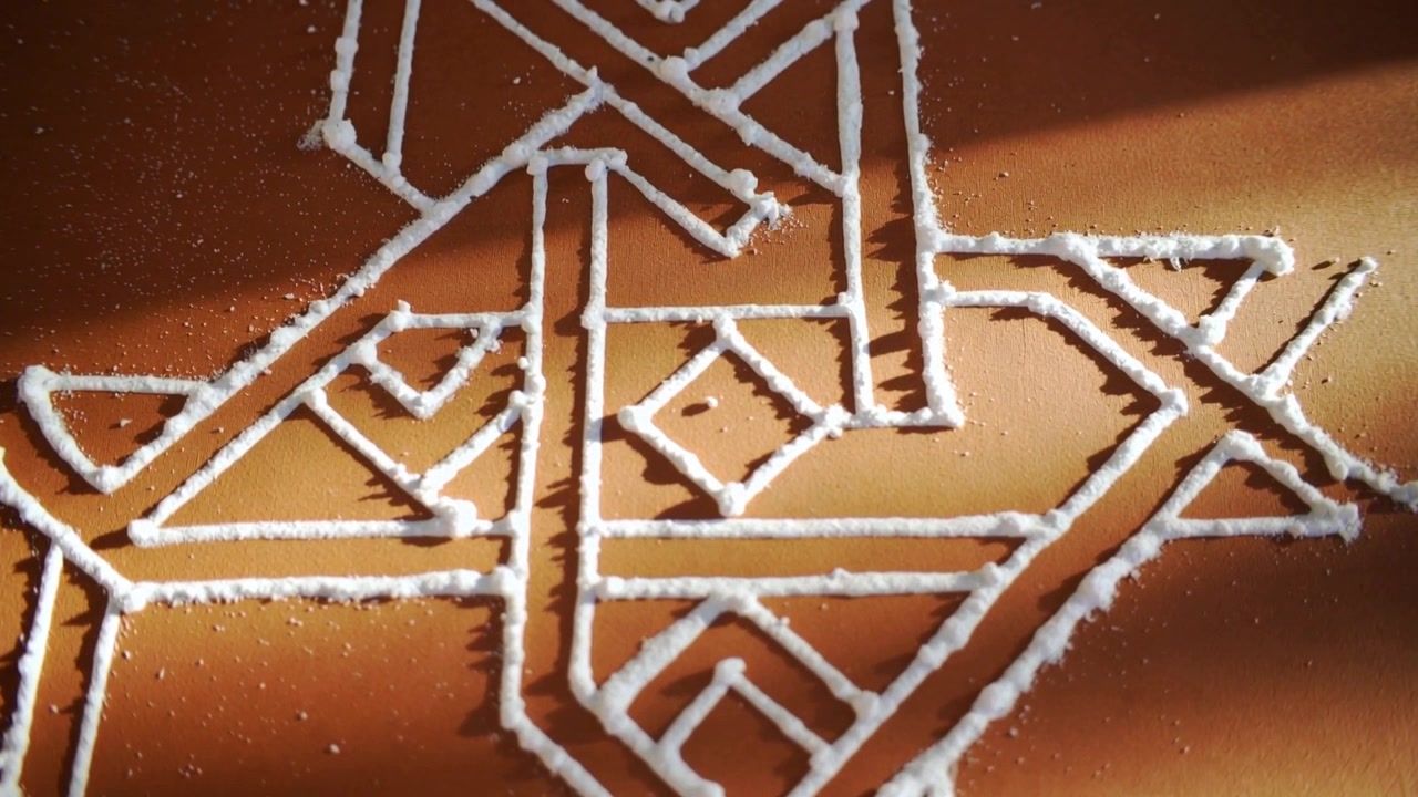 Showing white powder lines under shifting window light on clay surface with diagonal shadow band