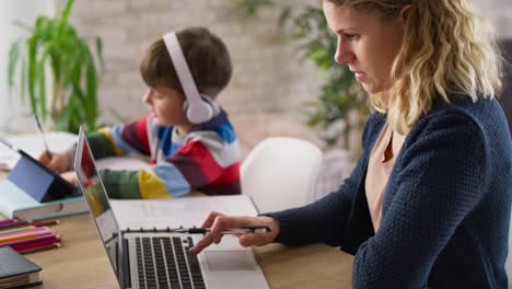 Video-of-mother-during-home-office-and-son-during-homeschooling