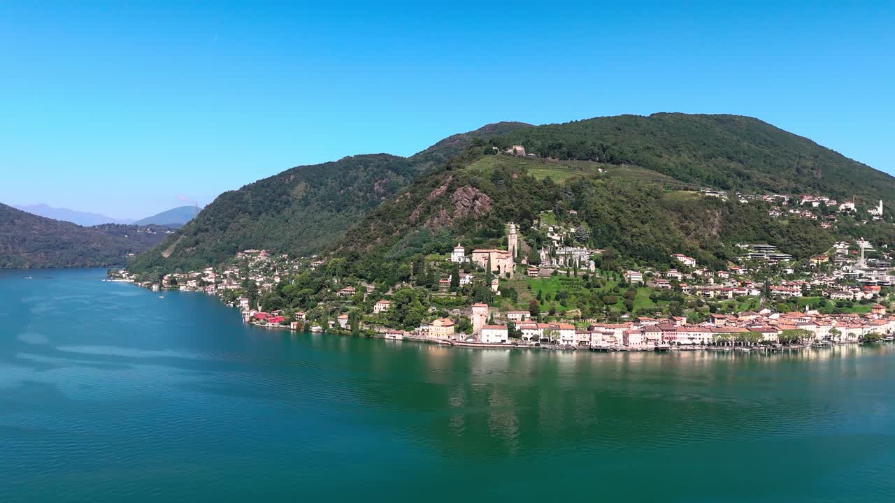View of Morcote in Switzerland. Church, houses, Lake Lugano and more