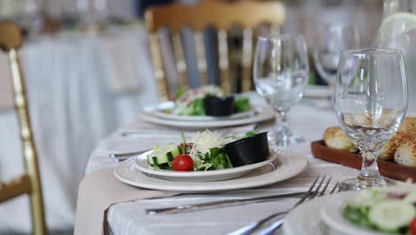 starter garden salad appetizer on plate at wedding reception luxurious party